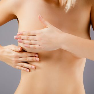 Почему болит грудь после овуляции, и является ли это нормой?