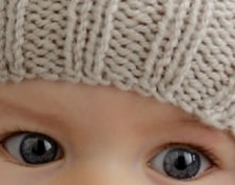 Шапочка для новорожденного спицами со схемами и описанием