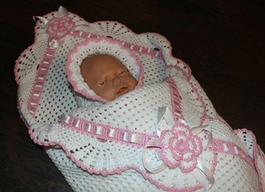 Конверт для новорождённого спицами: особенности выбора пряжи, узоров, вязание по схеме своими руками