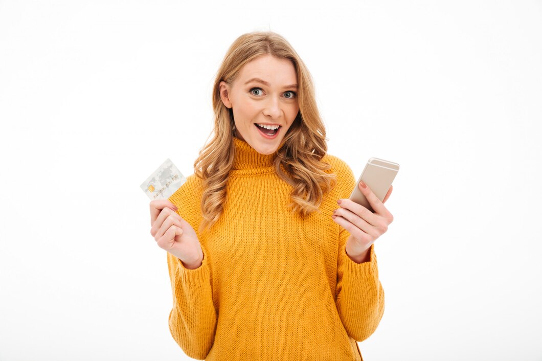 https://ru.freepik.com/free-photo/smiling-young-woman-holding-mobile-phone-and-credit-card_6515917.htm#fromView=search&page=1&position=5&uuid=712e5fc1-26f2-4f0d-9bed-80a090dbc711